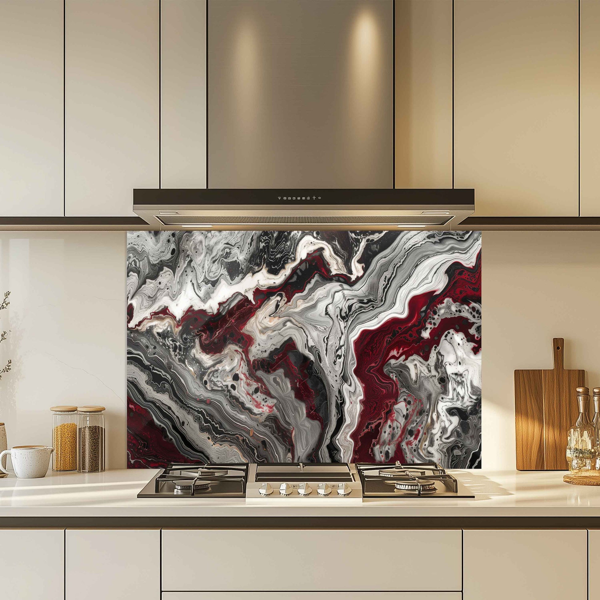Modern kitchen with a decorative splashback panel featuring abstract red and gray design.