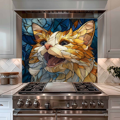 Stainless steel oven with a colorful cat mosaic tile in a kitchen setting