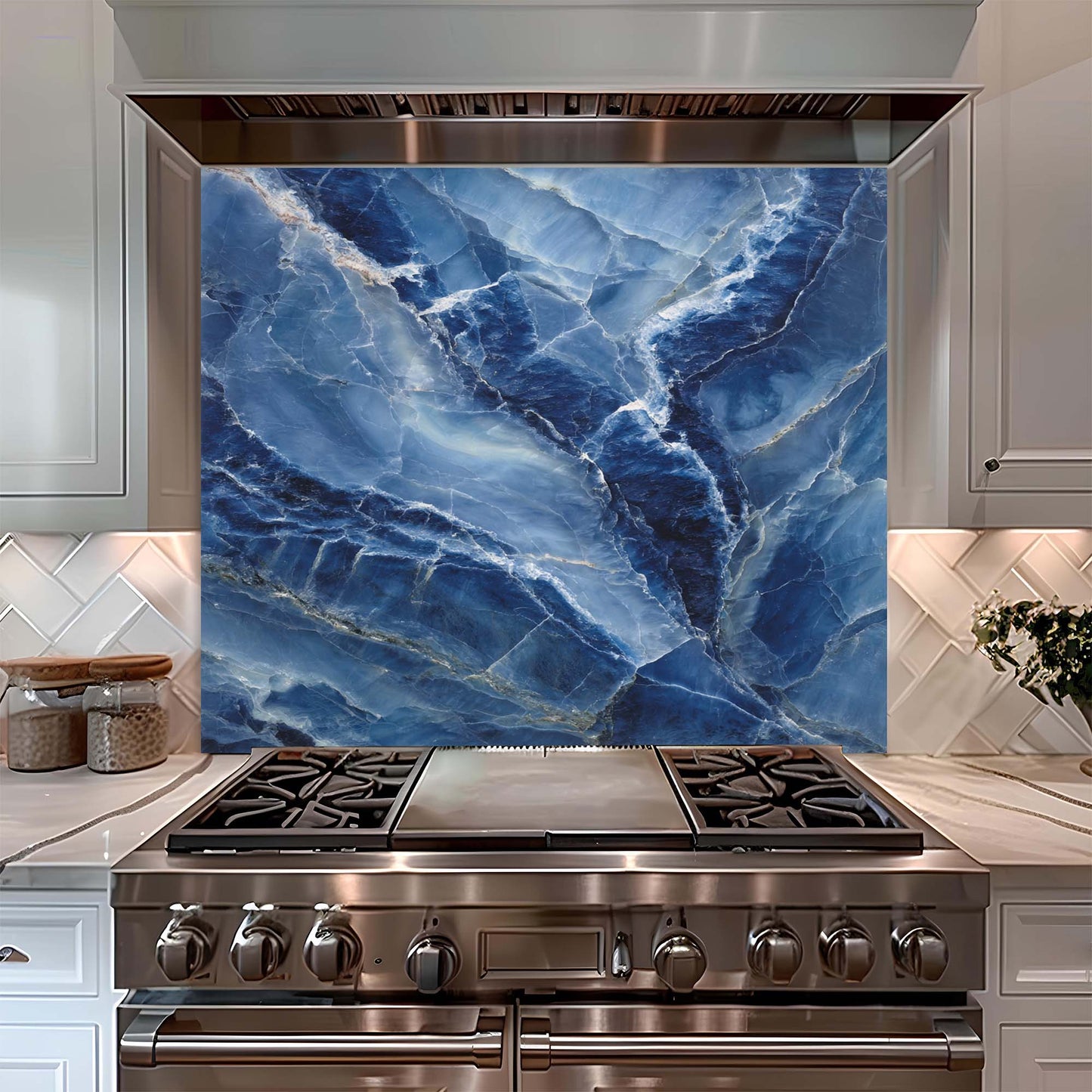 Stainless steel stove with blue marble glass backsplash in a kitchen setting