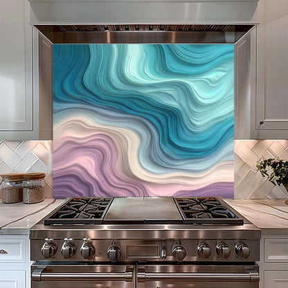 Stainless steel stove with a colorful abstract glass backsplash in a kitchen setting.