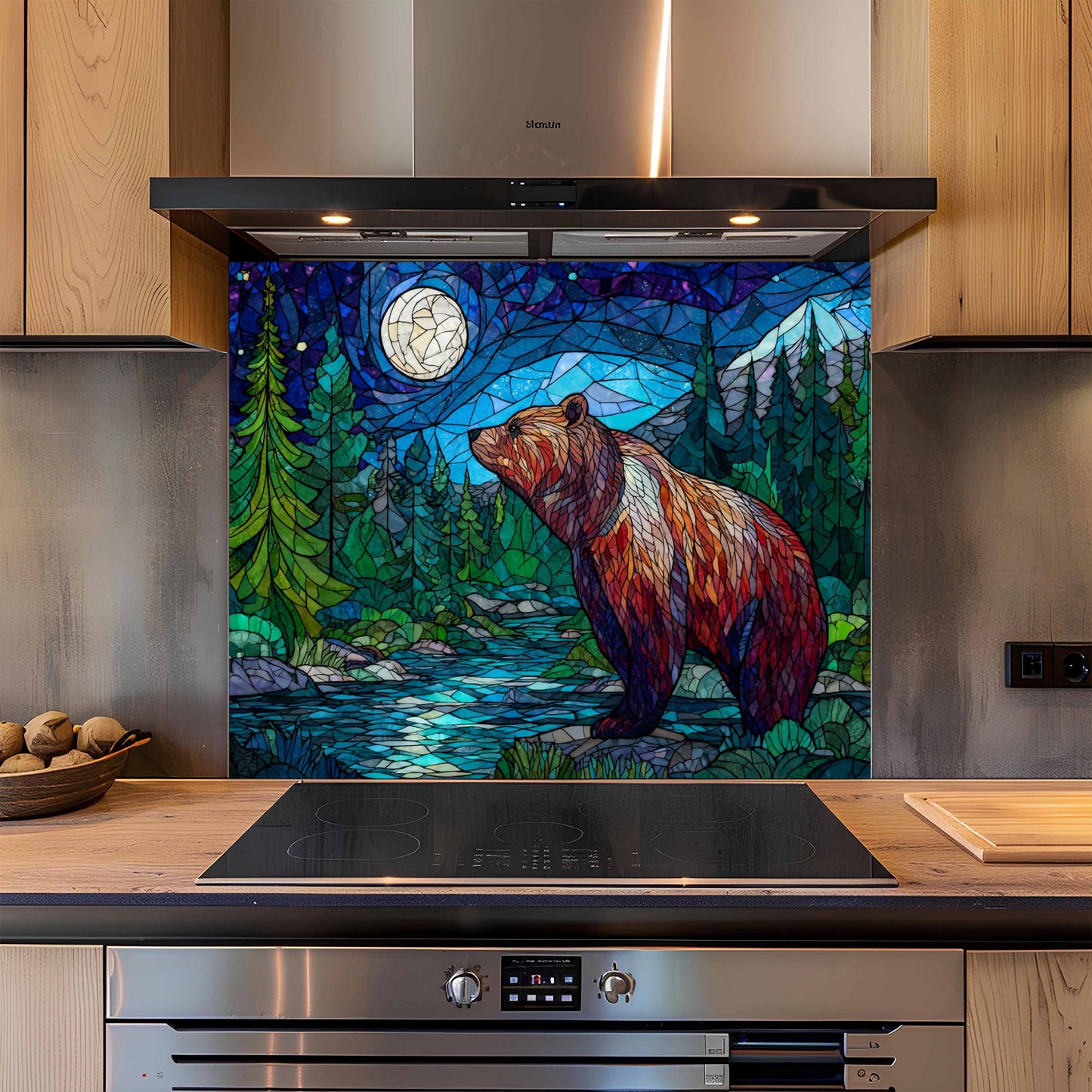 Stylized bear scene on a kitchen backsplash with stainless steel appliances.