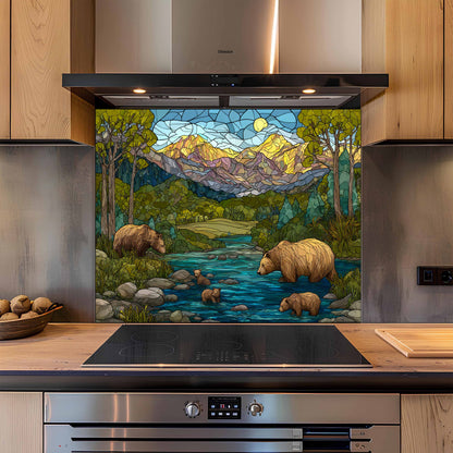 Kitchen with a decorative glass splashback featuring bears and a river