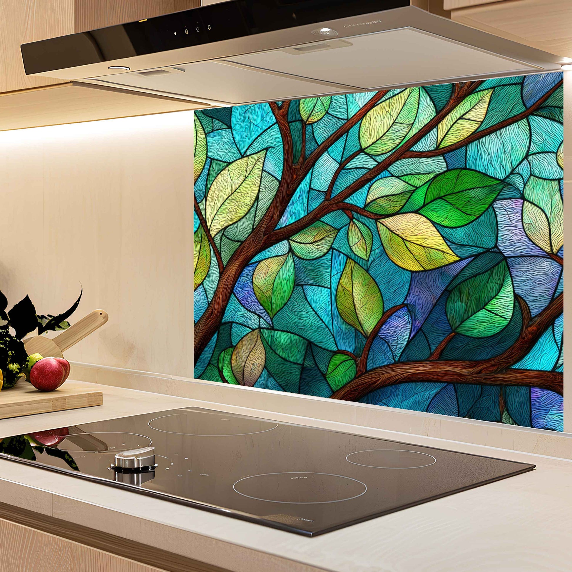 Kitchen with a decorative glass splashback featuring a tree design.