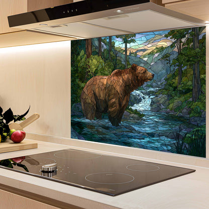 Kitchen with a decorative glass splashback featuring a bear and nature scene.