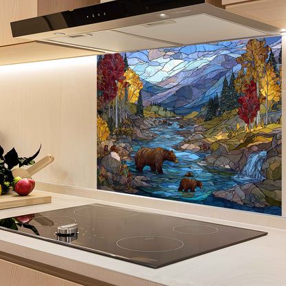 Kitchen with a decorative glass splashback featuring a bear and nature scene.