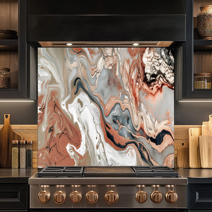 Stainless steel kitchen stove with marble splashback in a modern kitchen setting