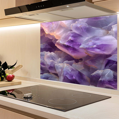Kitchen with a colorful glass backsplash featuring purple and pink crystals.