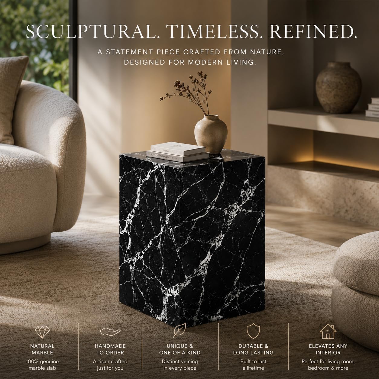 Black marble side table in a modern living room setting with text describing its qualities.