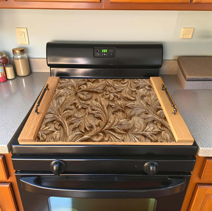 Stove with decorative wooden cover on a kitchen counter