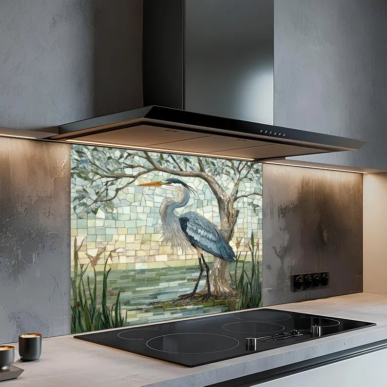 Modern kitchen with a decorative glass splashback featuring a heron and nature scene.