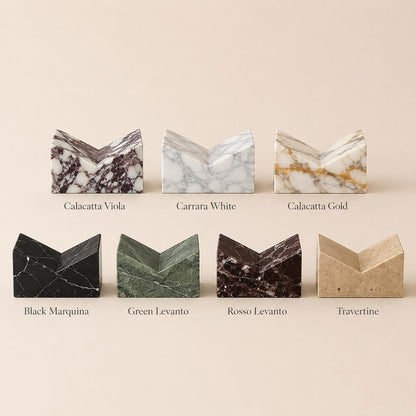 Seven labeled stone options: Calacatta Viola, Carrara White, Calacatta Gold, Black Marquina, Green Levanto, Rosso Levanto, and Travertine.