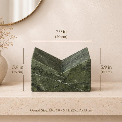 Green Levanto marble book stand front view with natural white veining.