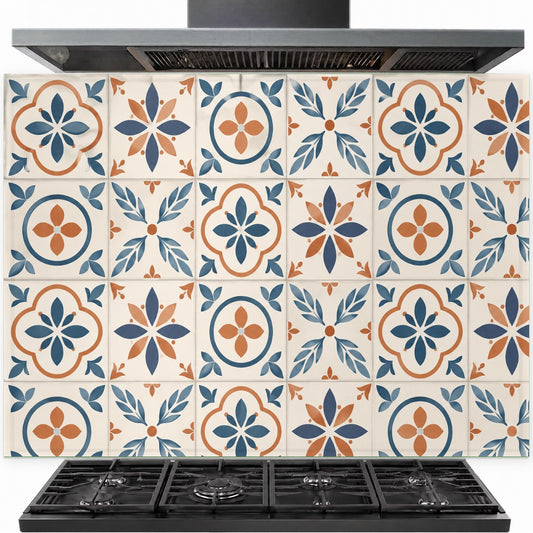 Mediterranean tiles tempered glass backsplash installed behind a stainless steel kitchen stove