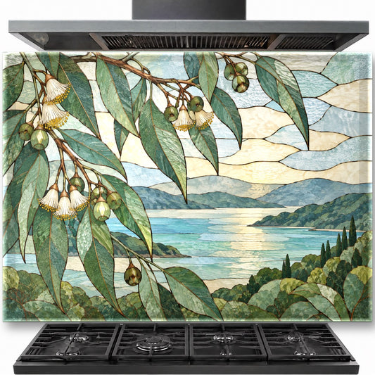 Leaves Stained tempered glass backsplash installed neatly behind a modern kitchen stove