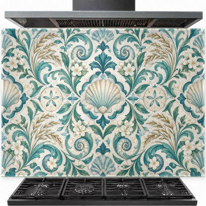 Seashell Damask tempered glass backsplash panel installed behind a gas stove in a coastal kitchen.