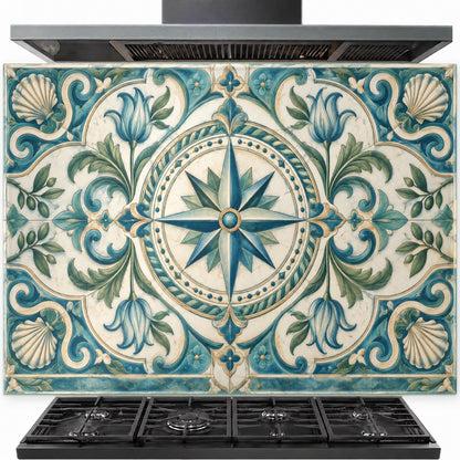 Compass Rose tempered glass backsplash installed behind a modern gas stove in a coastal-themed kitchen.