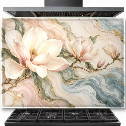 Marble Magnolia tempered glass backsplash installed behind a stainless steel gas stove