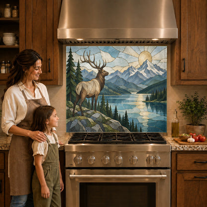 Close-up of the Elk River glass backsplash panel mounted behind a modern induction cooktop.