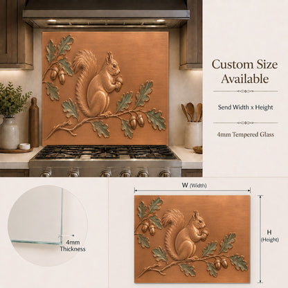 Beautiful forest animal glass backsplash panel mounted over a clean white marble countertop and stove area.