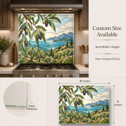 Olive green botanical kitchen glass backsplash behind a stainless steel range