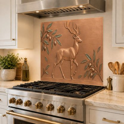 Heat resistant glass backsplash behind a stainless steel kitchen range