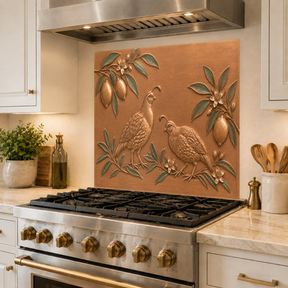 Tempered glass kitchen panel with citrus quail motif above a countertop prep station