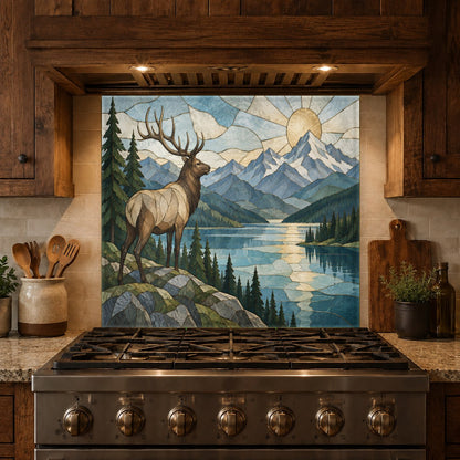 Grout-free Elk River scene glass kitchen backsplash covering the wall behind a stainless steel kitchen sink.