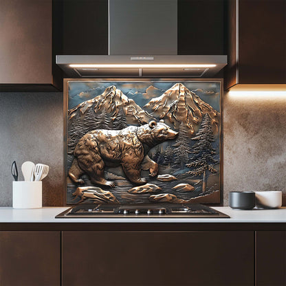Decorative glass backsplash of a bear and mountains above a stove in a kitchen.