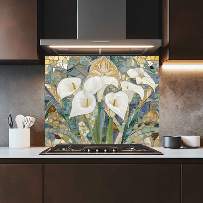 Kitchen with a decorative glass splashback featuring white flowers and abstract patterns.