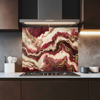 Kitchen with a decorative backsplash featuring red and gold marbled pattern.