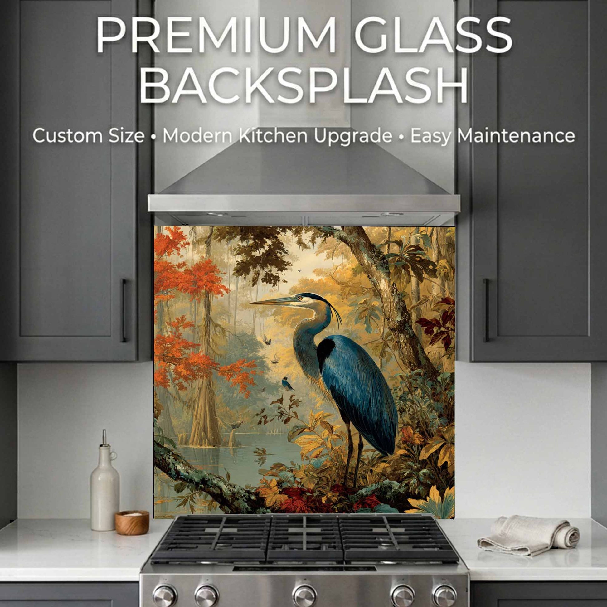 Kitchen with a decorative glass backsplash featuring a heron, surrounded by trees and foliage.