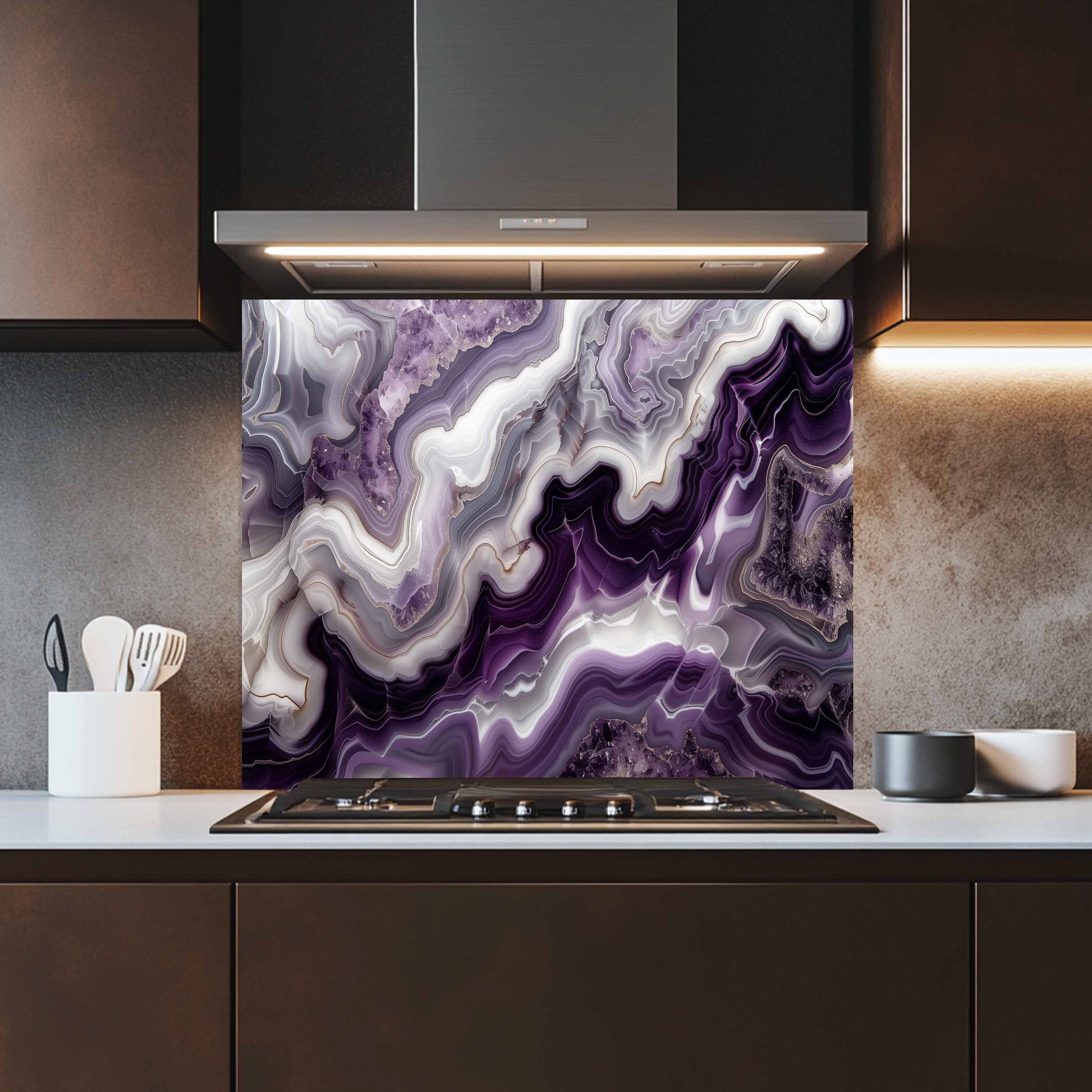 Kitchen with a purple and white marbled backsplash above a stove.