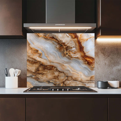 Modern kitchen with a decorative glass backsplash featuring a marble-like pattern.