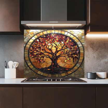 Kitchen with a decorative glass backsplash featuring a tree design.