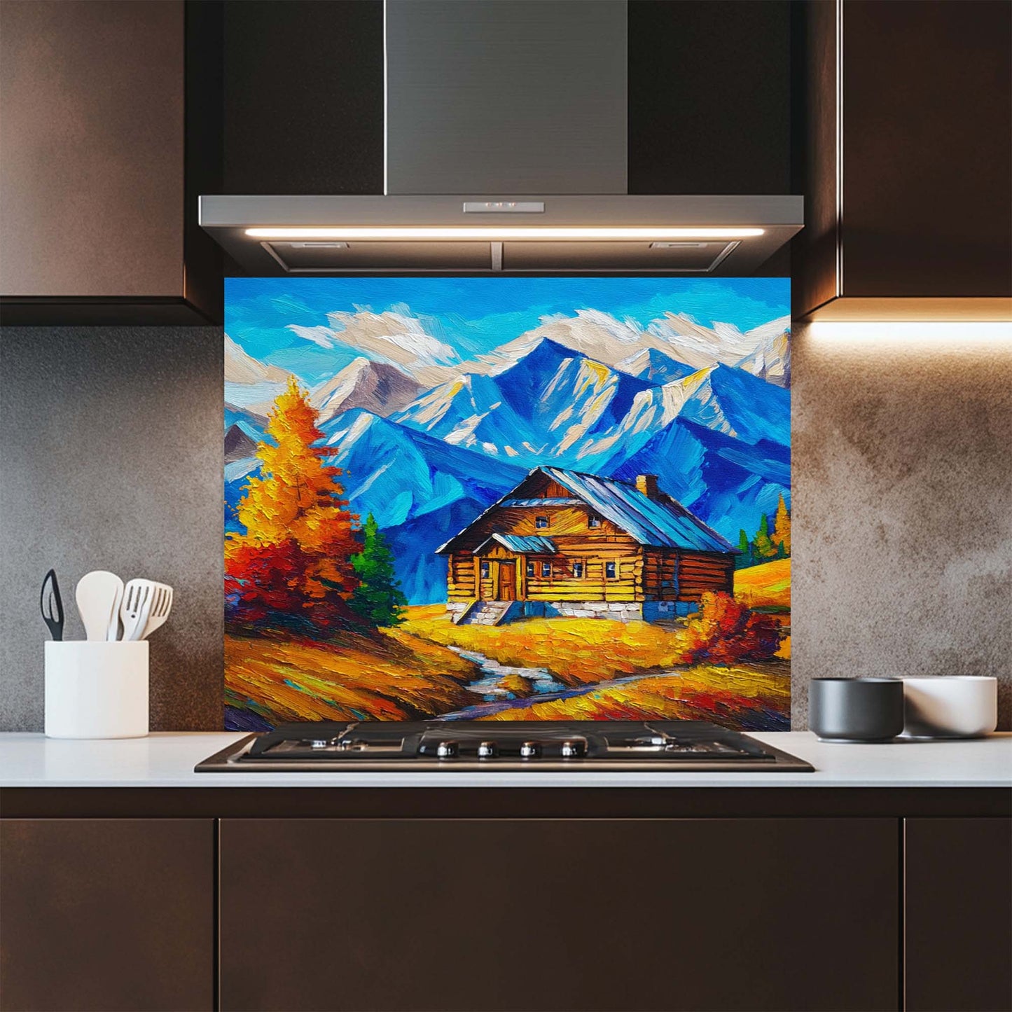 Kitchen with a colorful mountain scene glass splashback