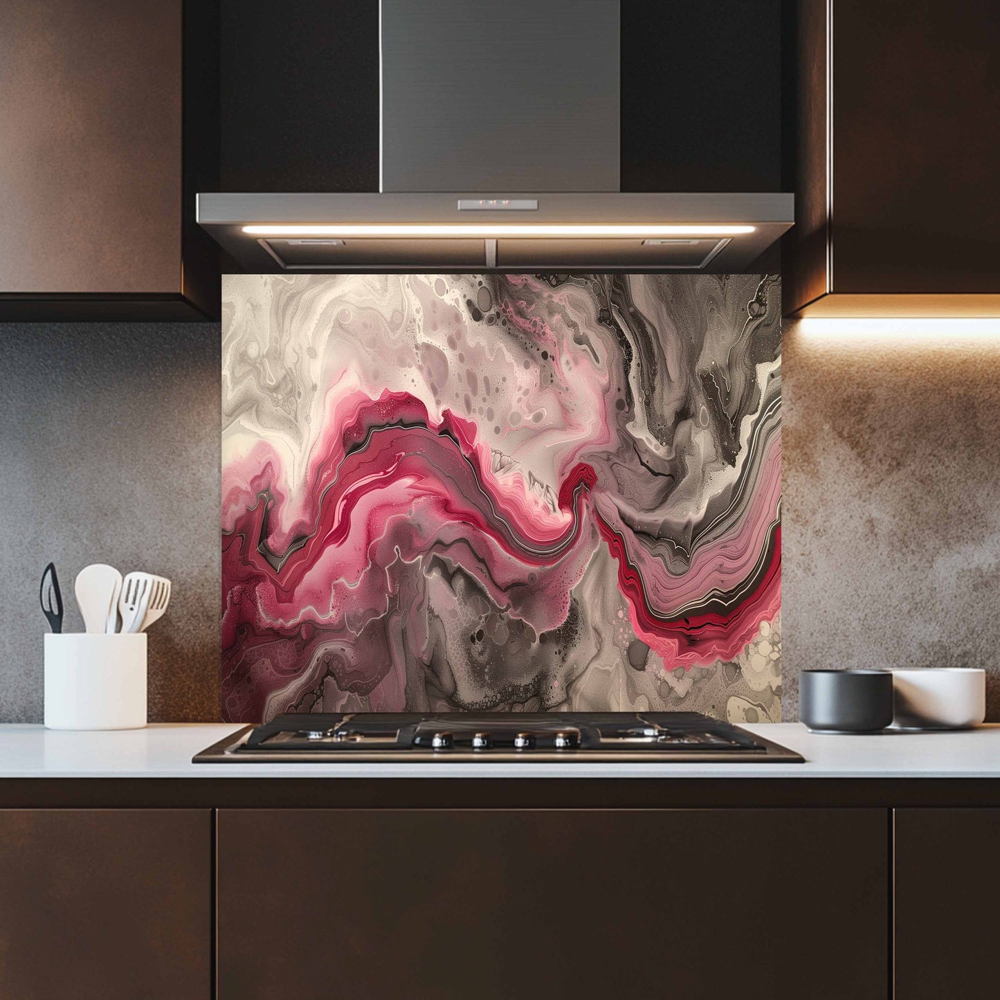 Kitchen with a modern stove and abstract art splashback