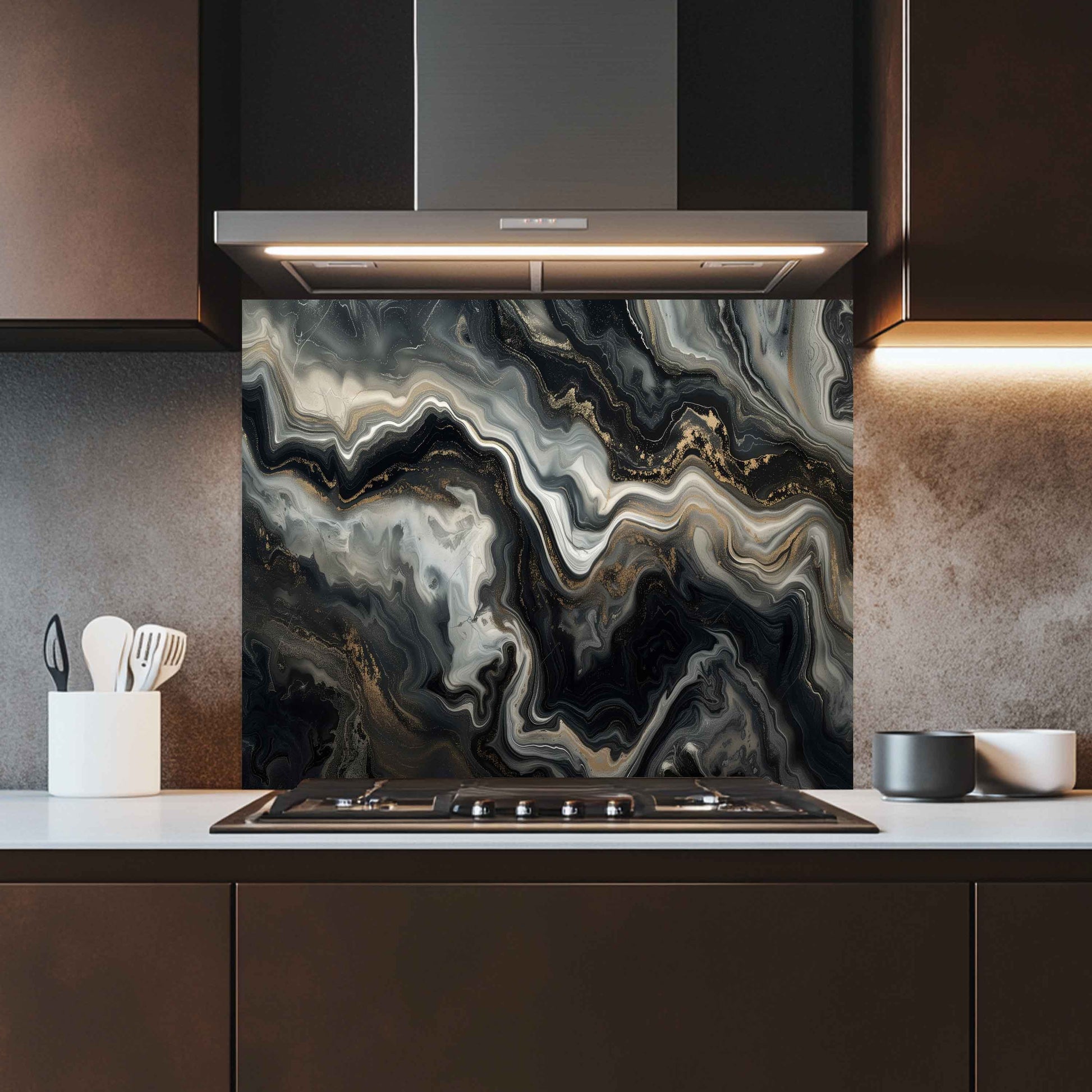 Modern kitchen with a marbled splashback panel above a stove.