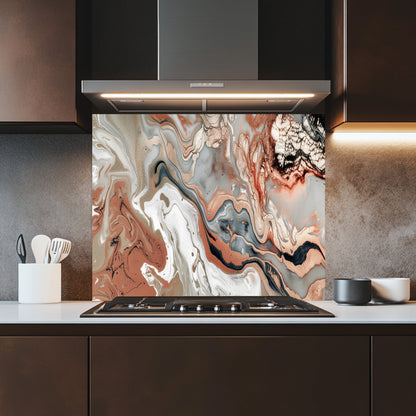 Kitchen with a modern stove and abstract patterned backsplash
