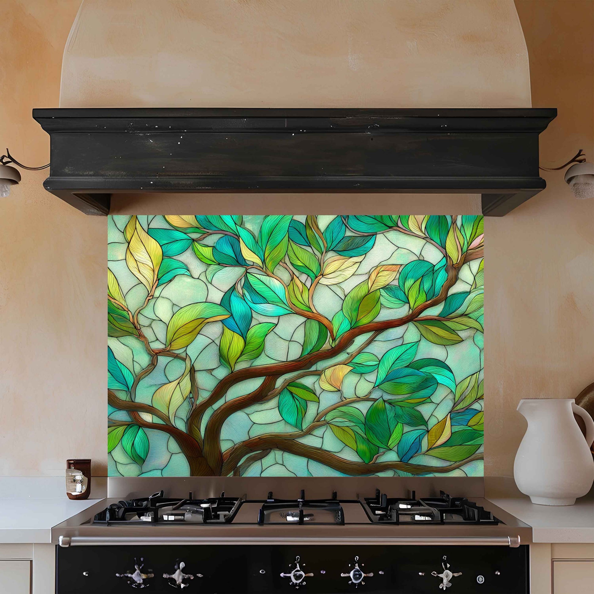 Stylish kitchen with a decorative glass splashback featuring a tree design.