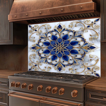 Decorative glass backsplash with blue and gold floral design in a kitchen setting