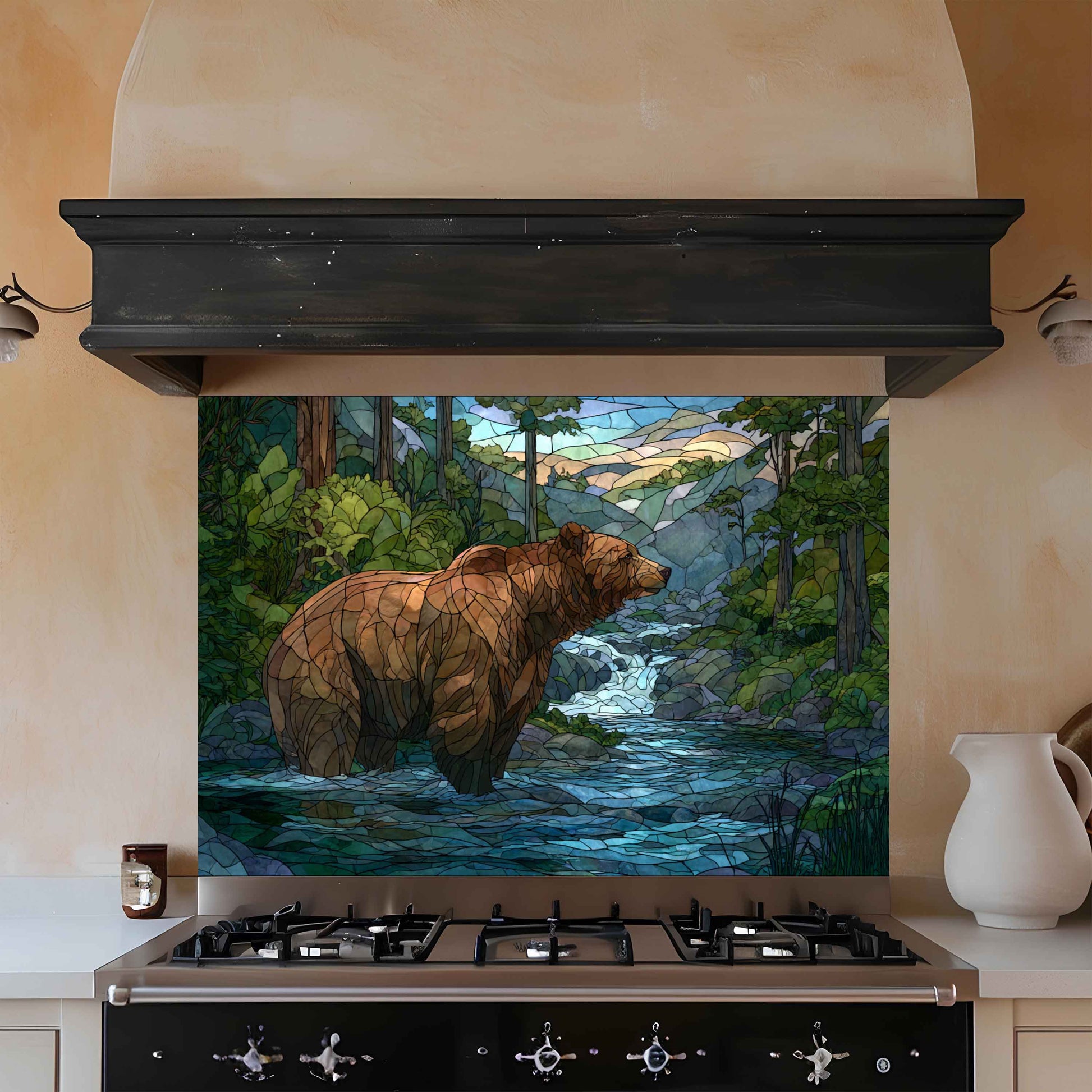 Kitchen with a decorative glass splashback featuring a bear in a forest scene.
