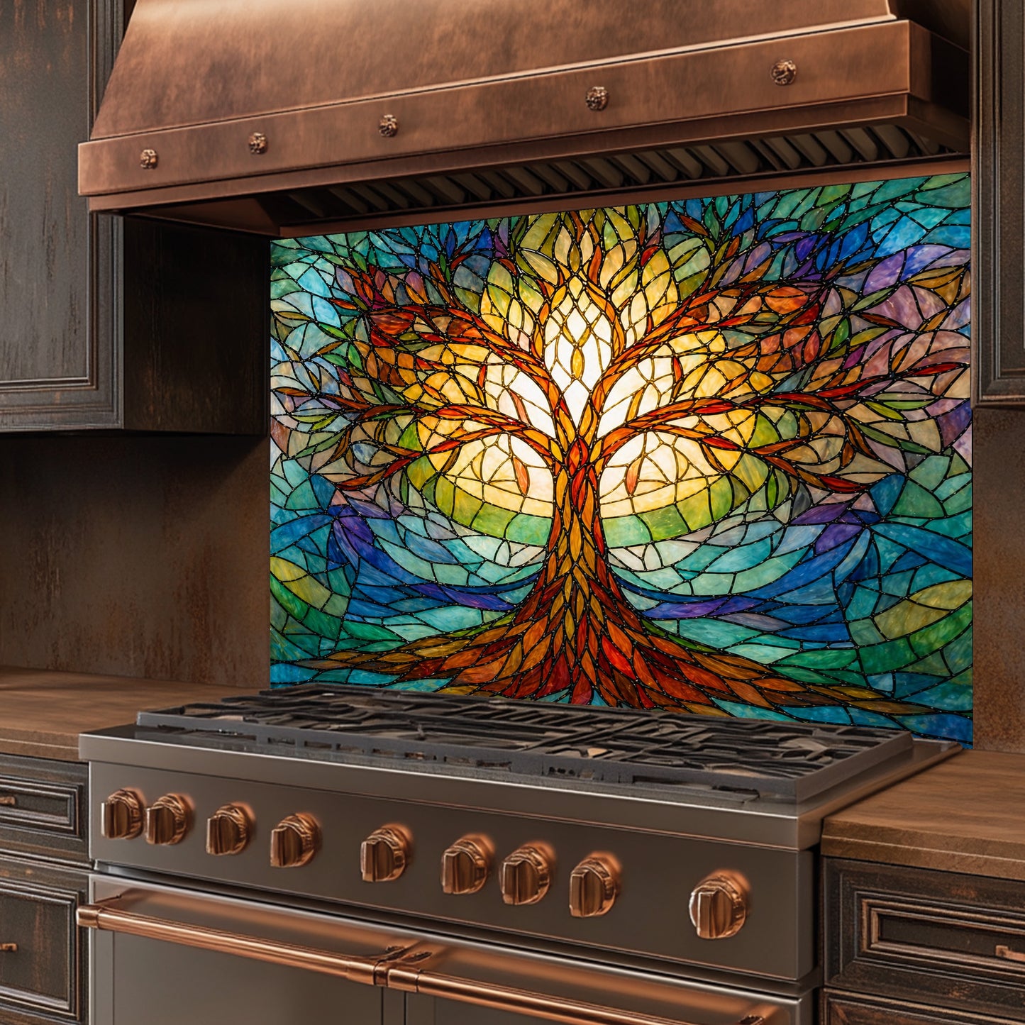 Stainless steel stove with a colorful stained glass-style tree of life glass backsplash