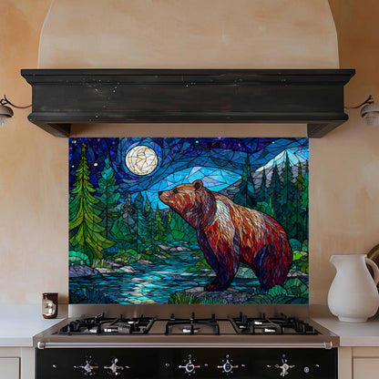 Stained glass bear backsplash above a stove in a kitchen