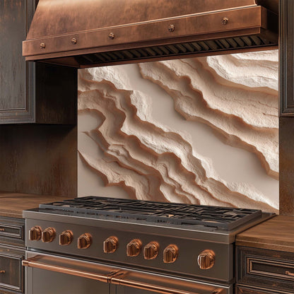 Stainless steel stove with glass backsplash in a kitchen setting