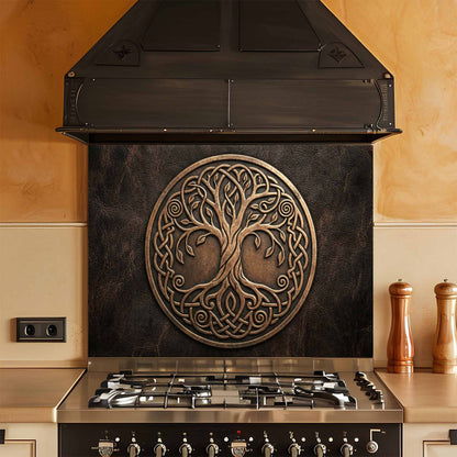 Decorative kitchen stove with tree of life design on a glass backsplash.