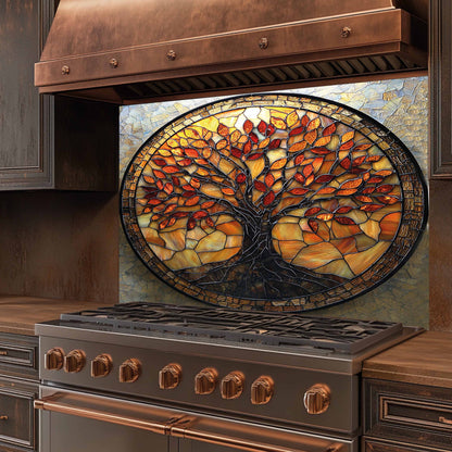Stainless steel stove with a decorative stained glass backsplash featuring a tree design.