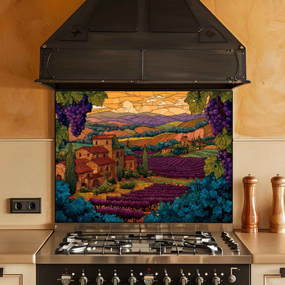 Stainless steel stove with a decorative backsplash featuring a vineyard scene.