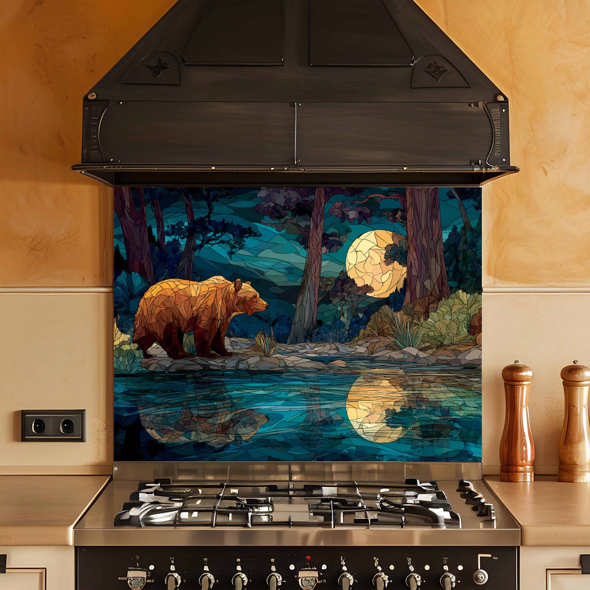 Stainless steel stove with a decorative glass splashback featuring a bear and moonlit forest design.