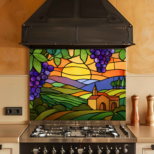 Stained glass backsplash with vineyard design above a stove in a kitchen.