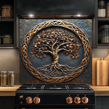 Decorative glass backsplash with a tree design above a kitchen stove.